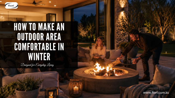 Modern Australian outdoor entertaining area with warm lighting, fire pit and friends enjoying a relaxed winter evening.