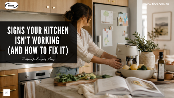 A well-designed kitchen with a homeowner moving a toaster aside before beginning dinner preparation.