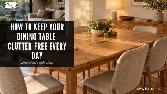 Warm timber dining table in a contemporary Australian home, with a book and cup of tea at one end and clear space for everyday use.